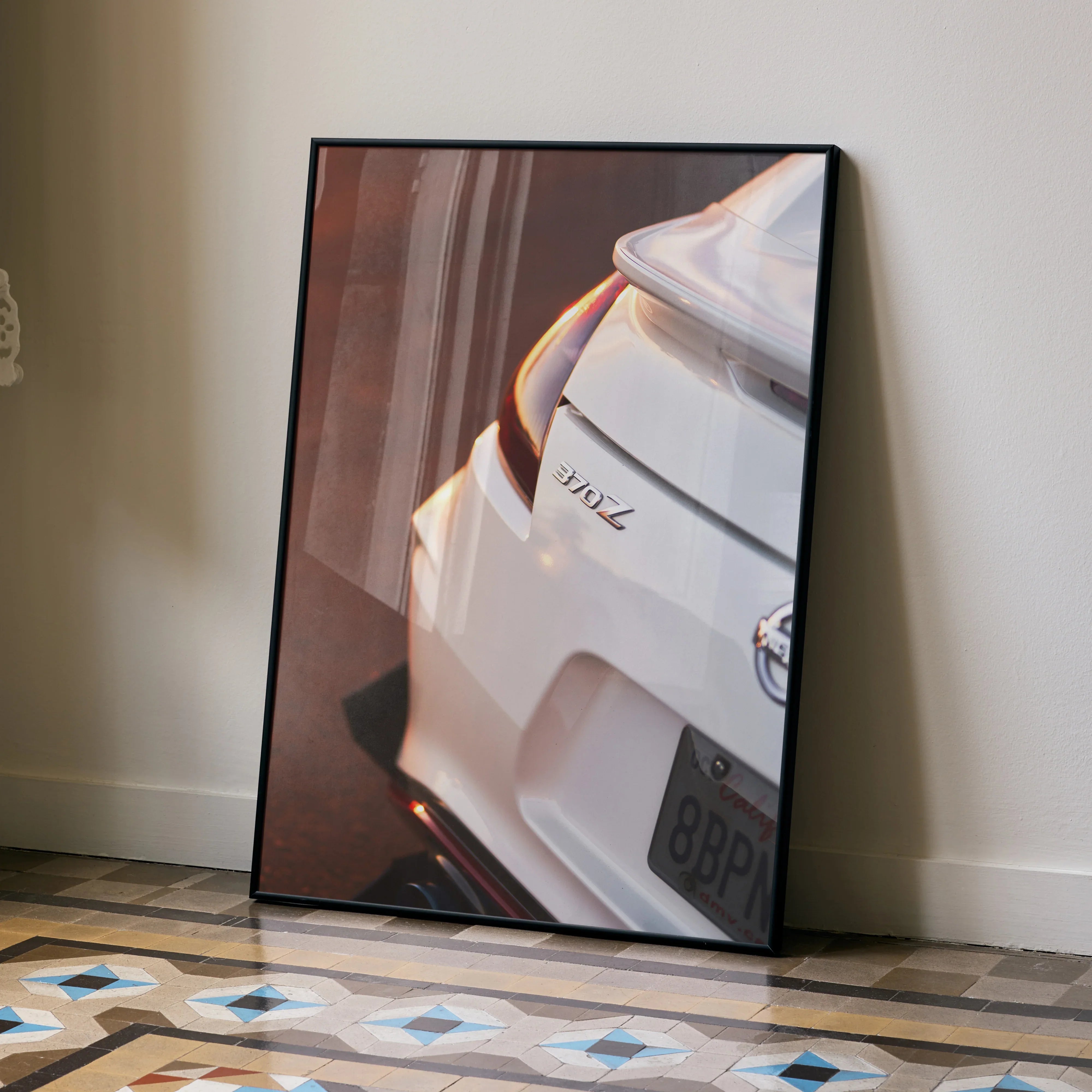 Nissan 370z close-up poster wall art showcasing rear detail in high resolution with sleek white finish.