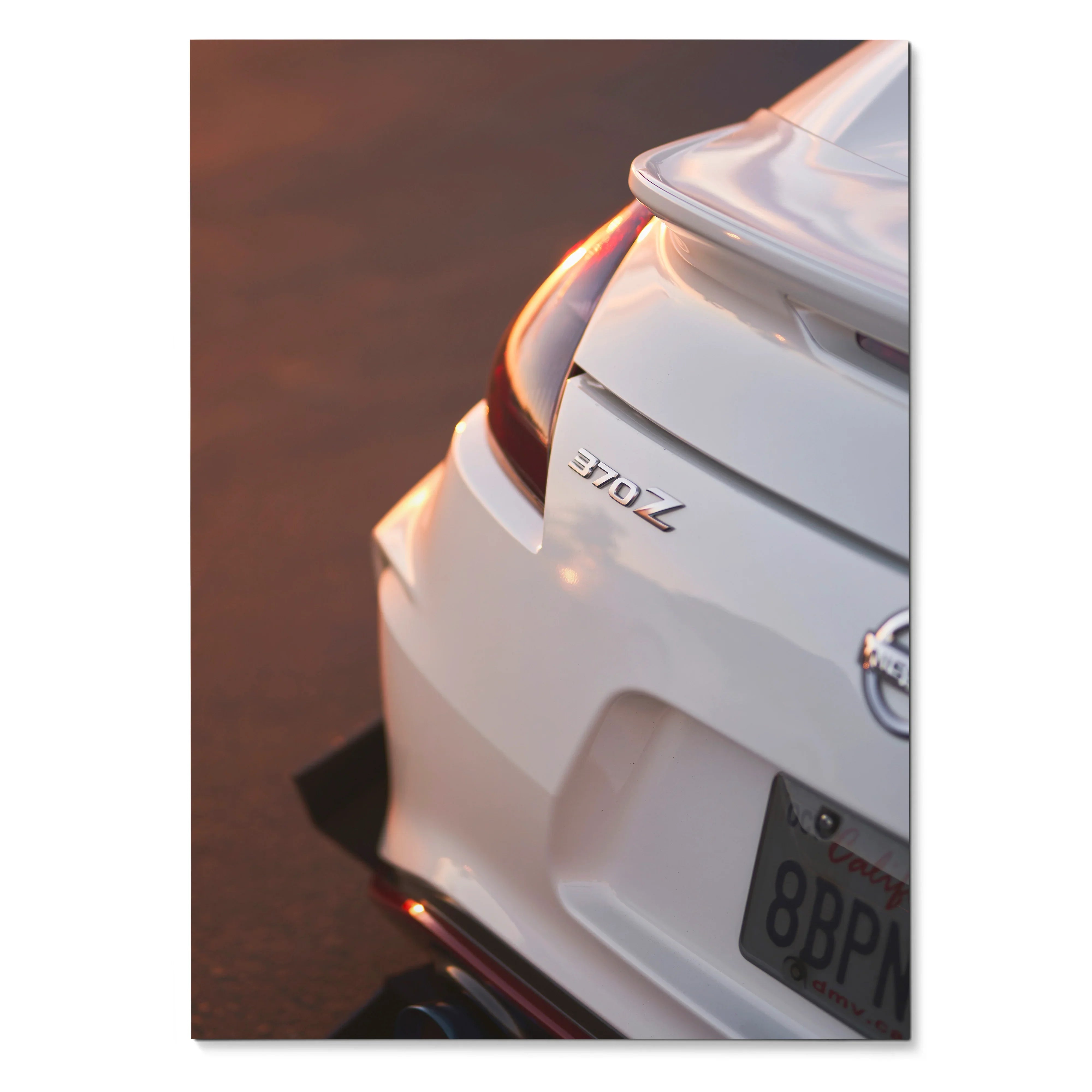 White Nissan 370z rear zoom with sunset reflection automotive wall art poster.