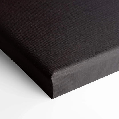 Close-up of black gallery-wrapped canvas corner showcasing textured canvas art for wall art display.