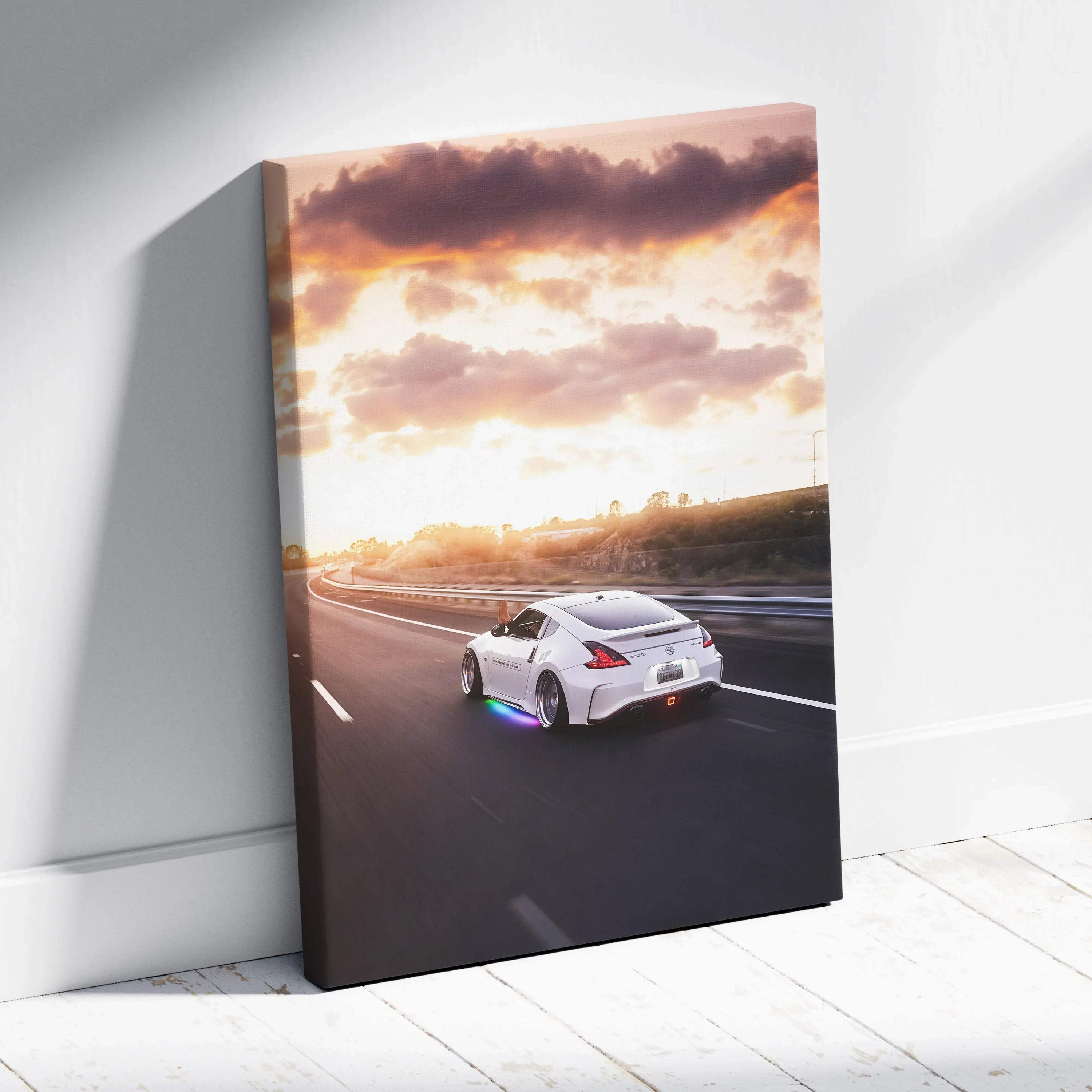 Nissan 370z driving at sunset vertical canvas art with vivid sky and road details wall art.
