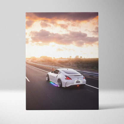 Nissan 370z sports car driving on highway at sunset vertical canvas art wall decor.