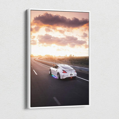 Nissan 370z driving on sunset highway vertical canvas wall art with dramatic sky.