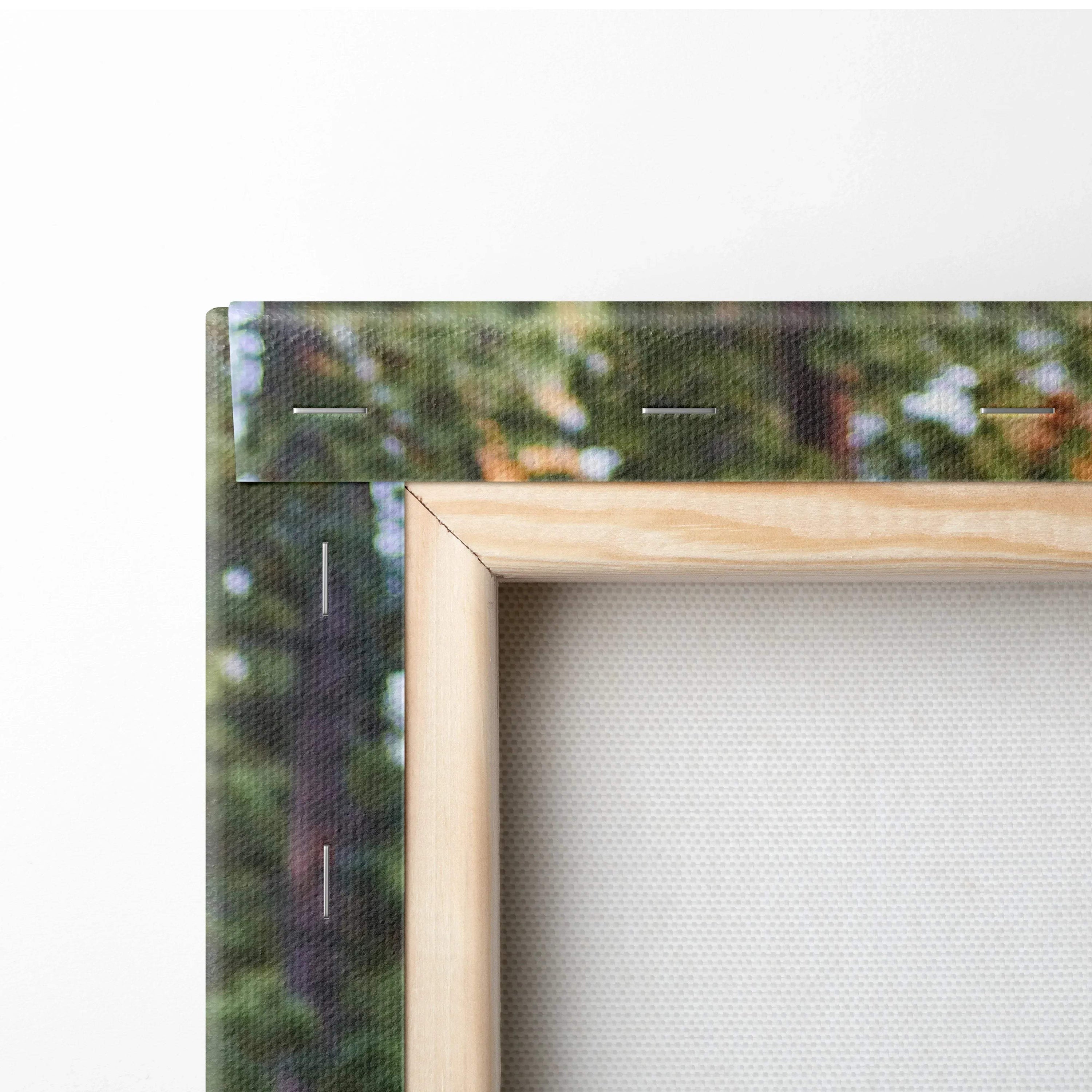 Natural wood frame corner with stretched canvas texture showcasing high-resolution wall art print.