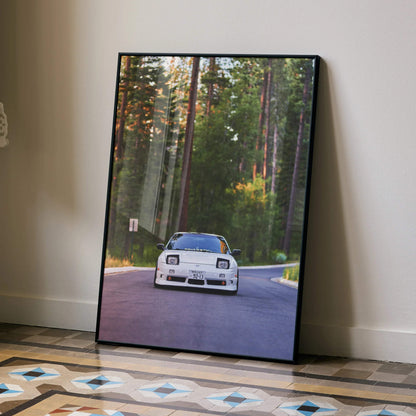 Nissan 240sx S13 Type-X framed poster showing white car on forest road, wall art in modern room.
