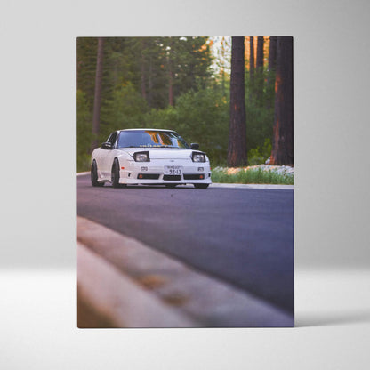 White Nissan 240sx Type X on forest road canvas wall art with vertical layout.