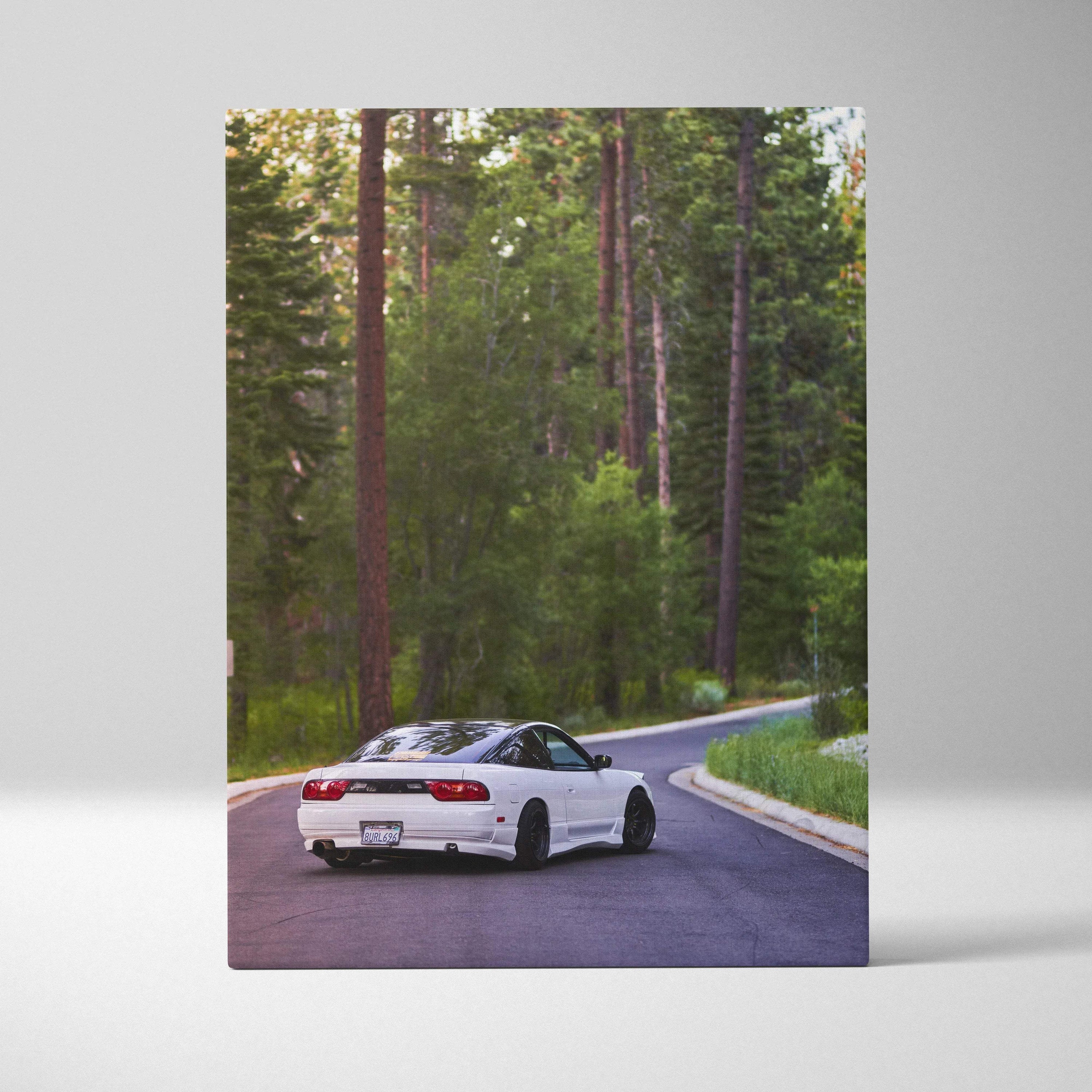 Vertical canvas wall art of a white Nissan 240sx Type X on a forest road, high resolution car art.