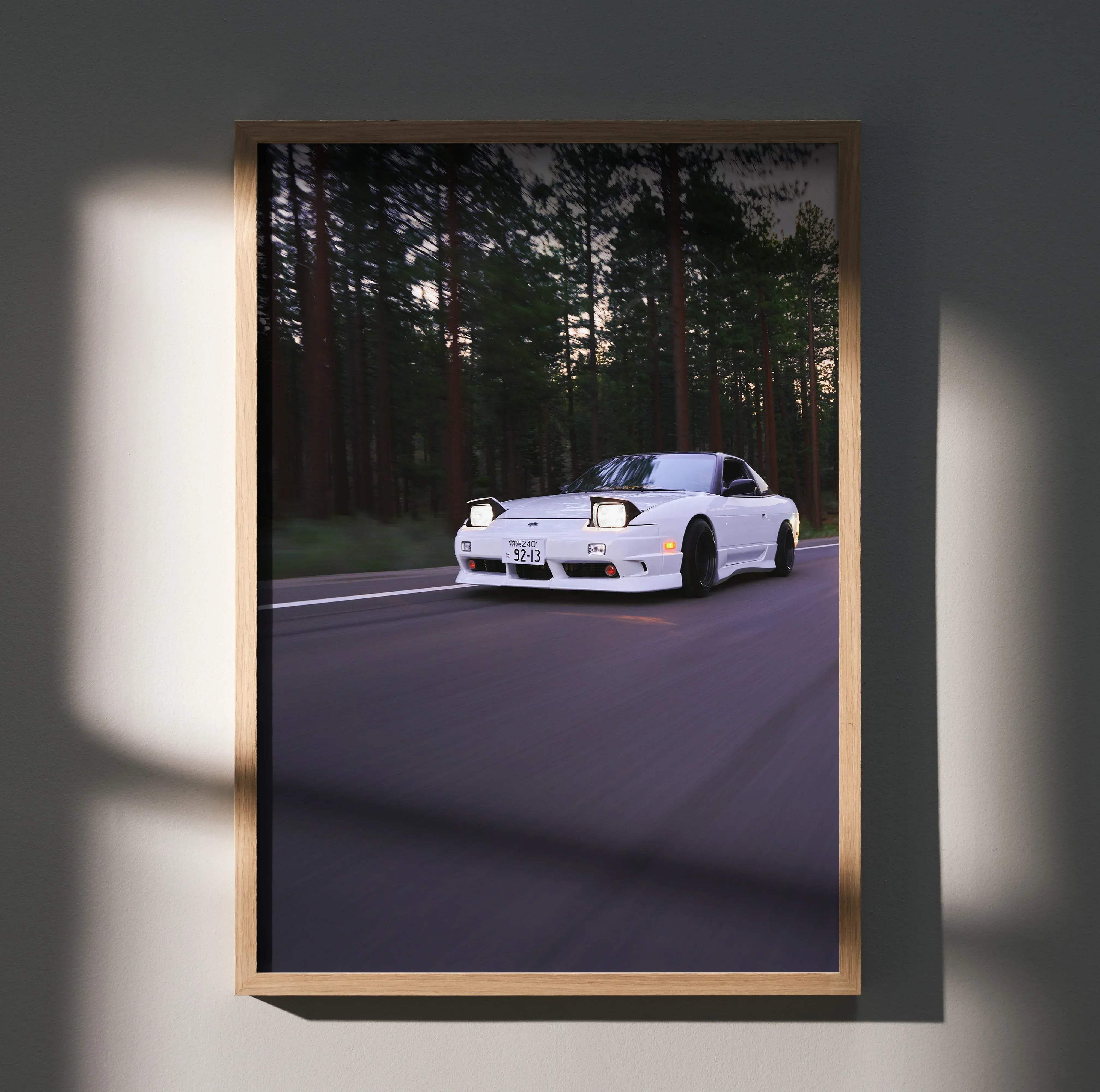 White nissan 180sx sports car photo in a light wood frame vintage art print for car enthusiasts