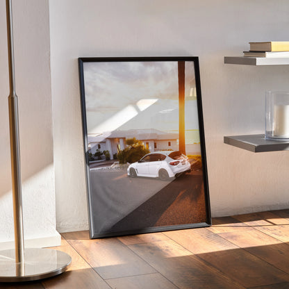 Subaru WRX STI poster with sunset and mountain backdrop, modern automotive wall art in black frame.