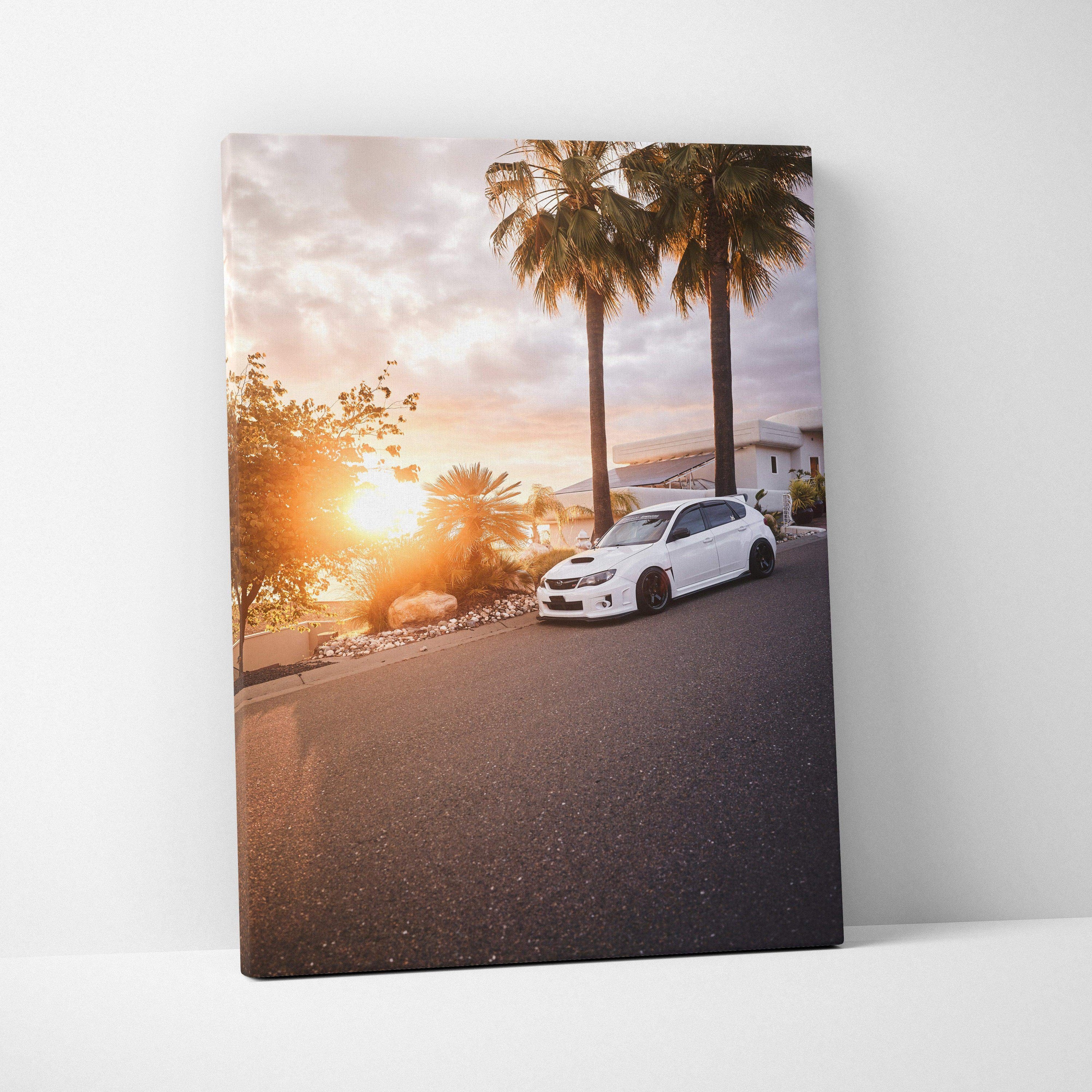 Subaru WRX STI canvas wall art with sunset and palm trees in vertical format.