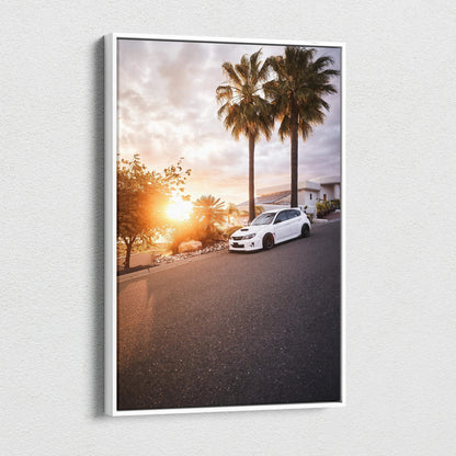 Subaru WRX STI parked on sunset street with palm trees, vertical canvas wall art.