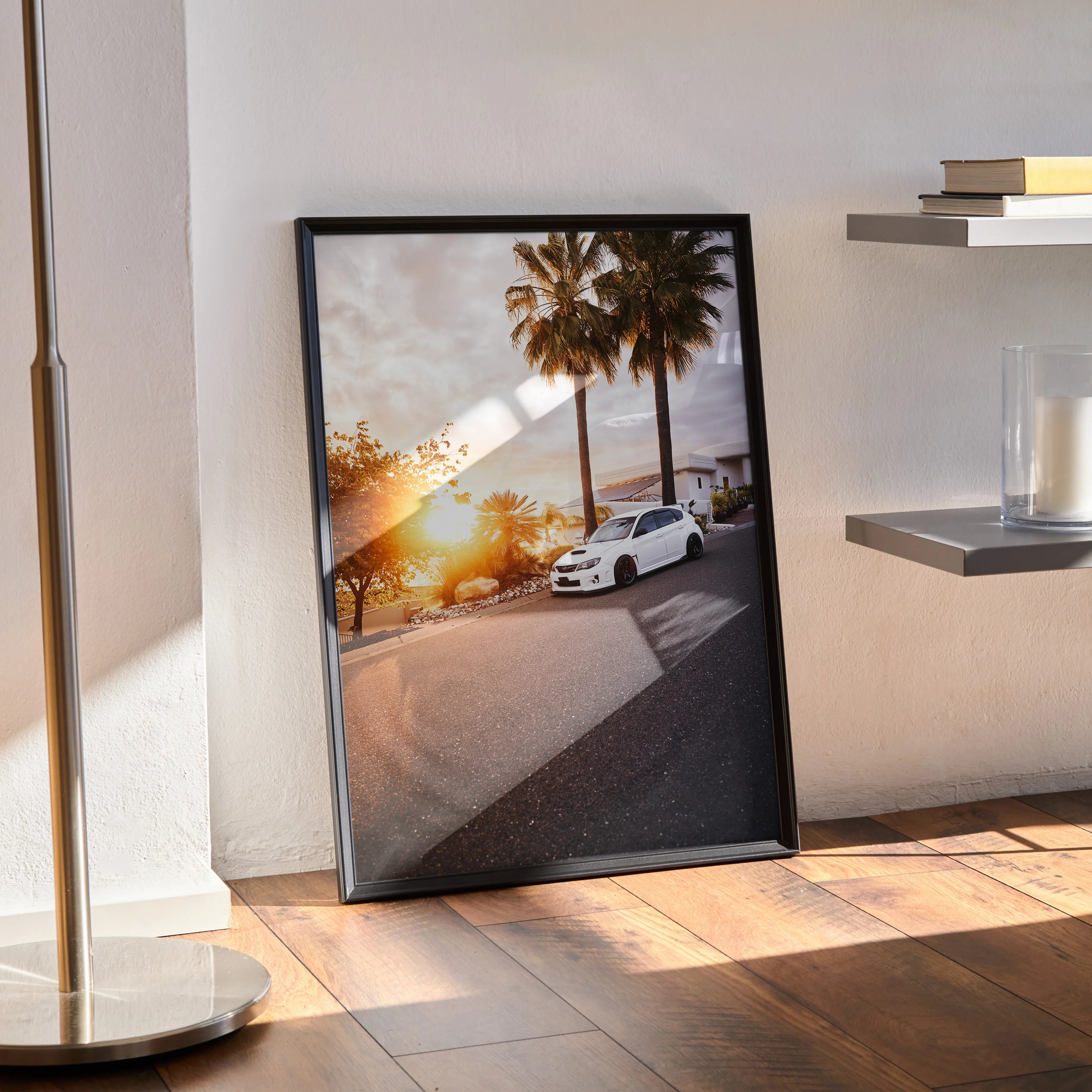 Framed Subaru WRX STI wall art poster with sunset and palm trees in vibrant colors.