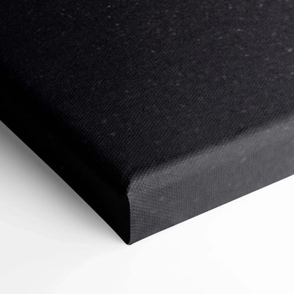 Black textured canvas corner showcasing museum-quality wall art with clean wrapped edges.