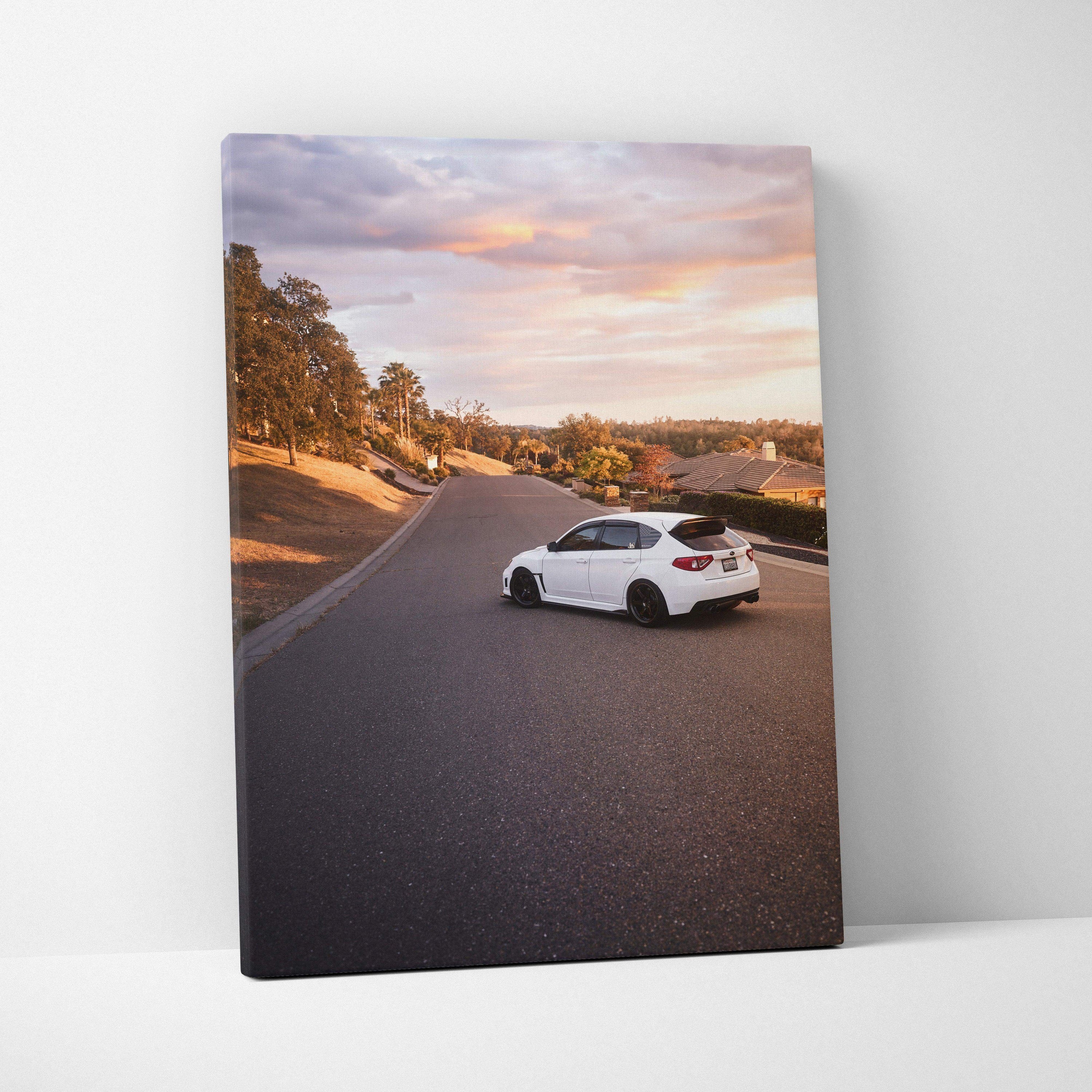 Subaru WRX STI on winding road at sunset, vertical canvas wall art print.