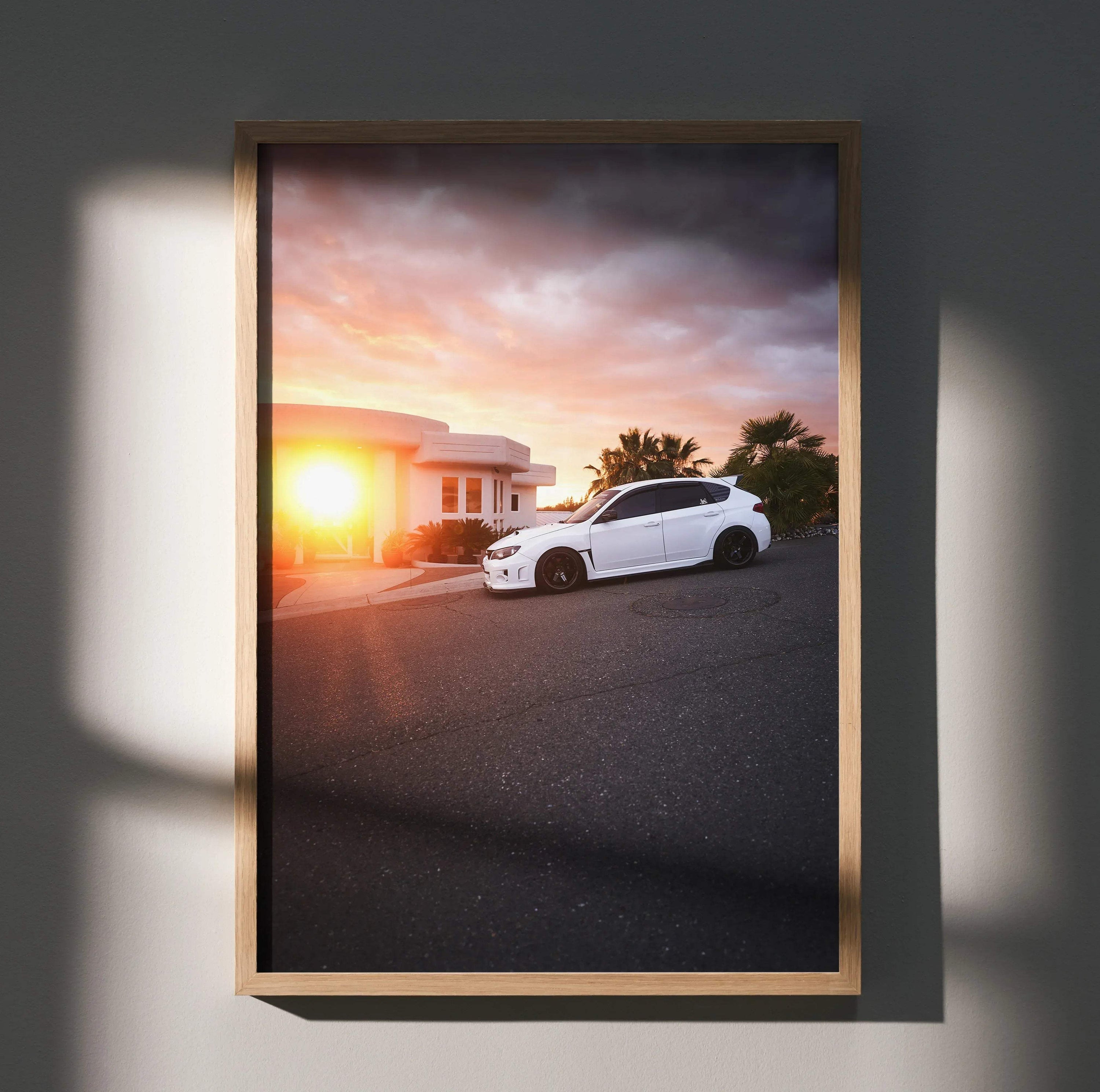 Subaru WRX STI poster with sunset background and white car on street wall art.