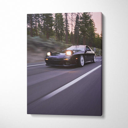 Mazda FC RX7 car speeding on forest road canvas wall art in vertical format.