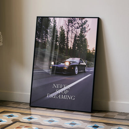 Motivational poster wall art featuring a black FC Mazda RX7 on a forest road at dusk with inspiring text "Never Stop.