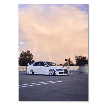 White Mitsubishi Evo 8 parked on rooftop with soft pastel sky, automotive poster wall art.