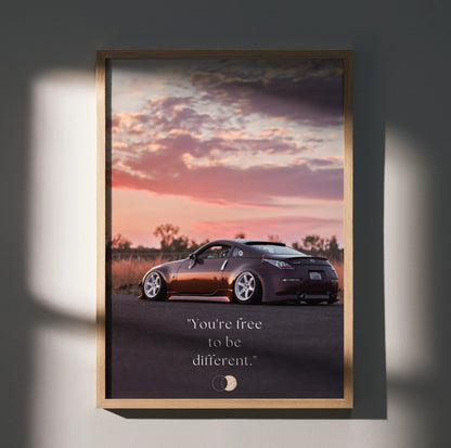 Motivational Nissan 350z poster wall art with sleek black sports car at sunset and inspiring quote.