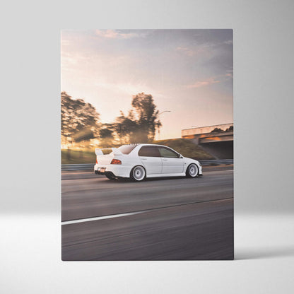 Mitsubishi Evo 8 white sports car on road canvas wall art with sunset background.