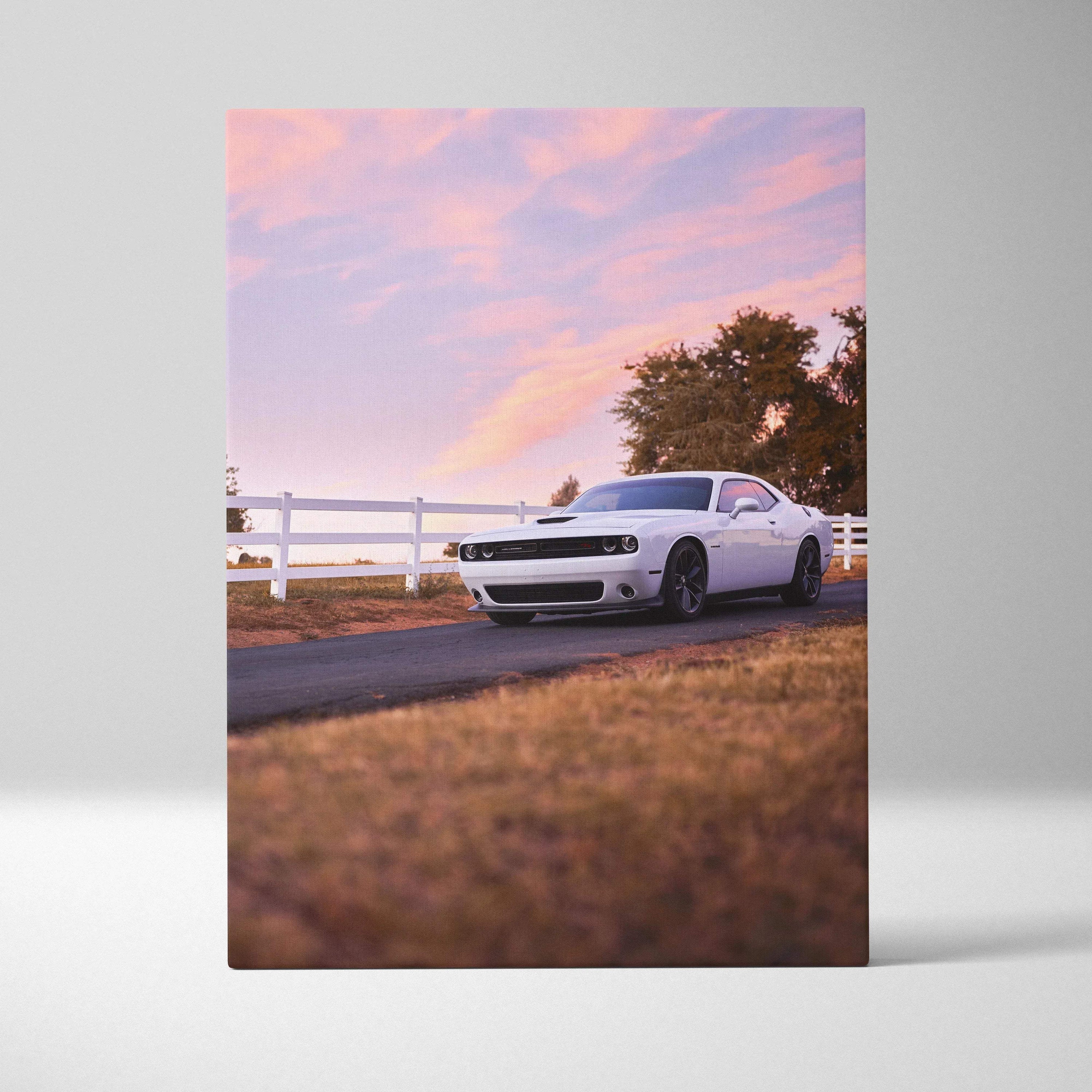 Dodge Challenger car canvas wall art with sunset sky and countryside road background.