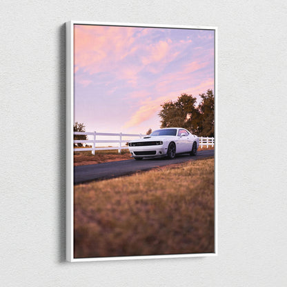 Dodge Challenger parked on road at sunset with pink sky canvas wall art vertical print.