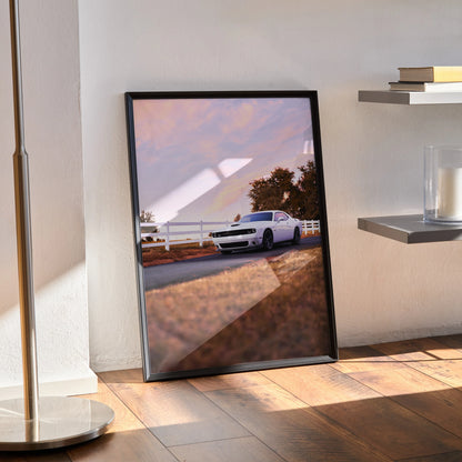 Dodge Challenger poster with sunset sky and road, stylish wall art in black frame.
