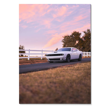 Dodge Challenger parked on country road at sunset with pink sky poster wall art.