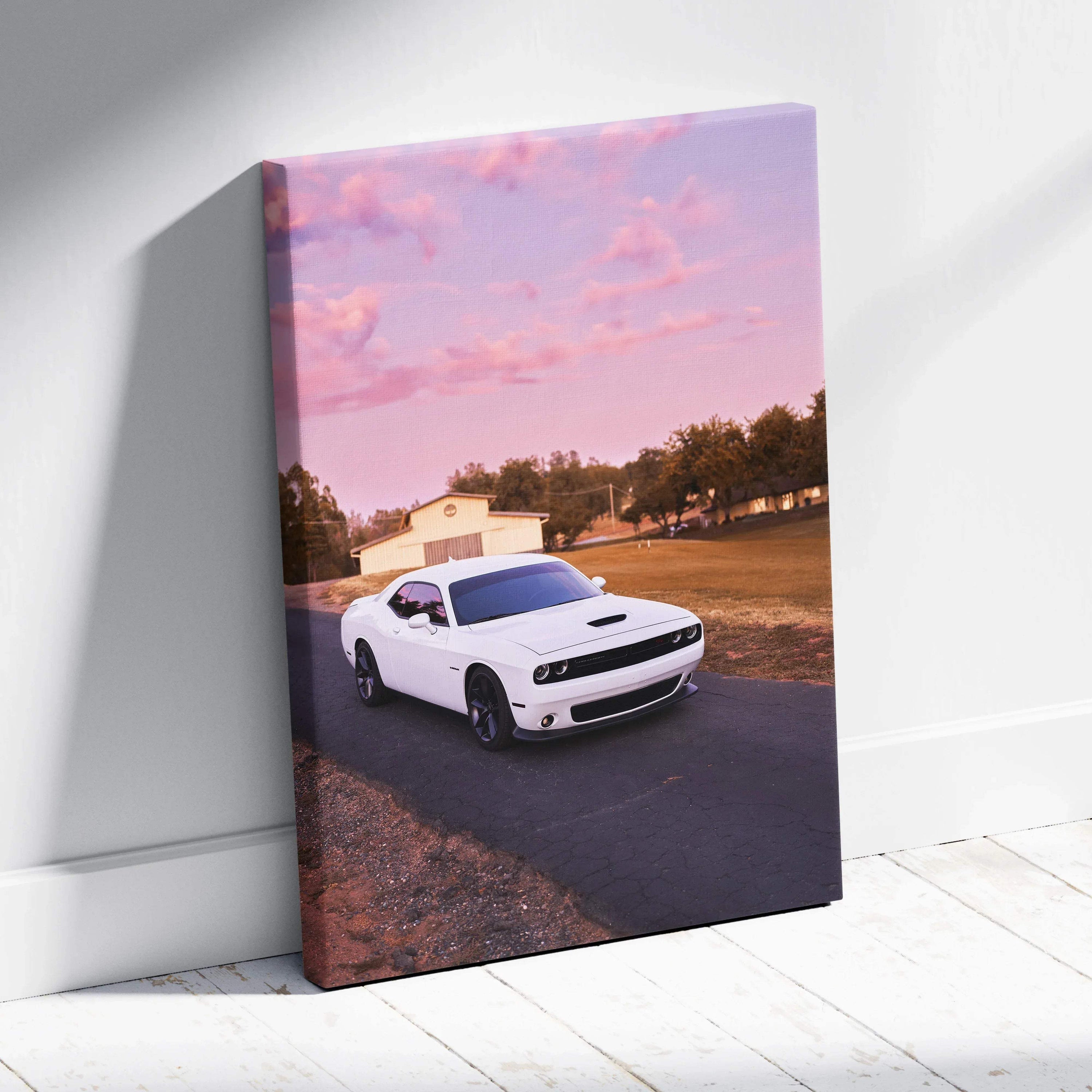 White Dodge Challenger on road at pink sunset canvas wall art print.