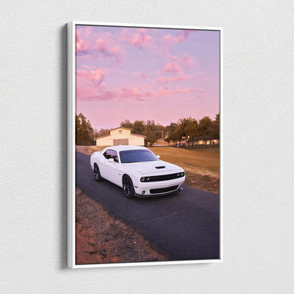 White Dodge Challenger driving on road under pink sunset sky canvas wall art.