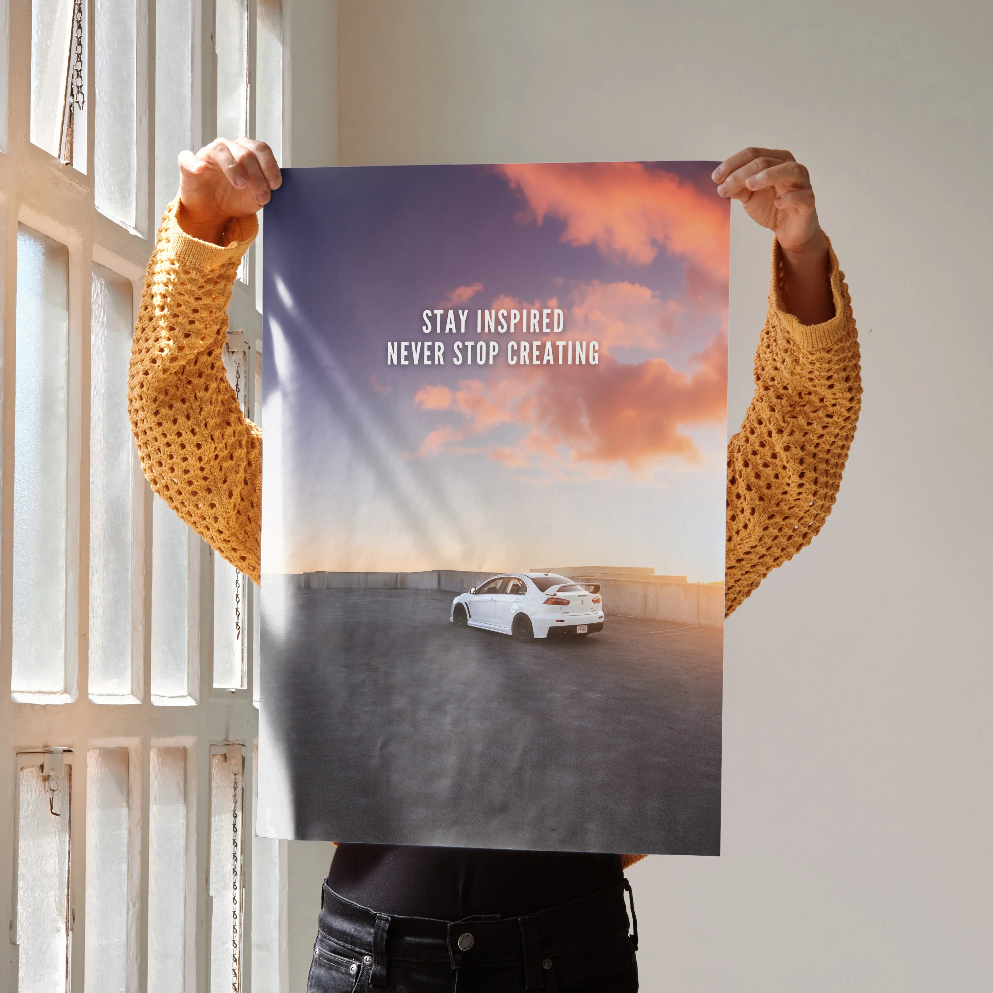 Poster wall art featuring a white Mitsubishi Evo 10 on a road at sunset with inspirational text.