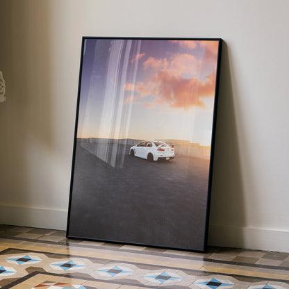Mitsubishi Evo 10 poster wall art with white car at sunset on open road in black frame.