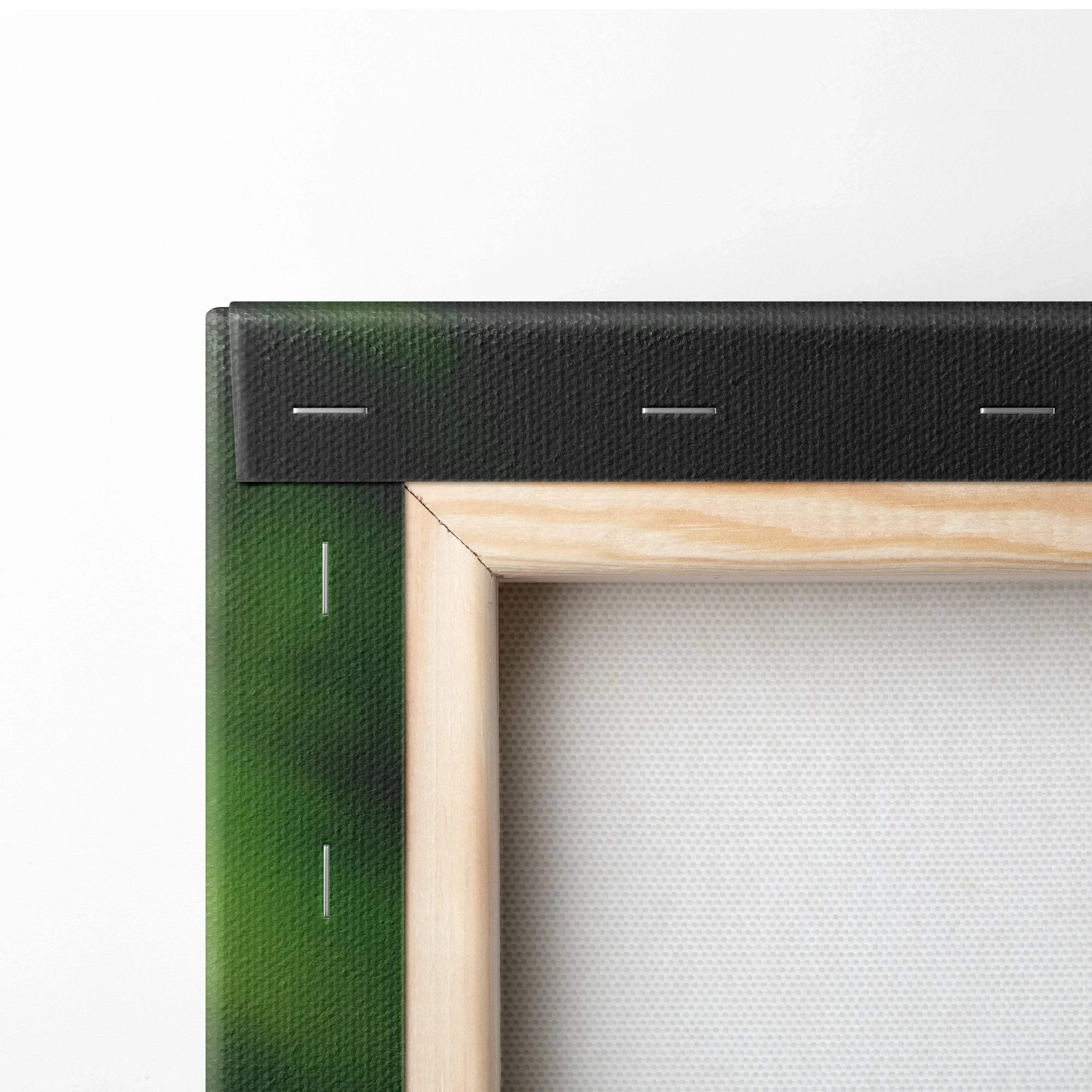 Close-up of wooden stretcher frame and stapled black canvas back for wall art decor.