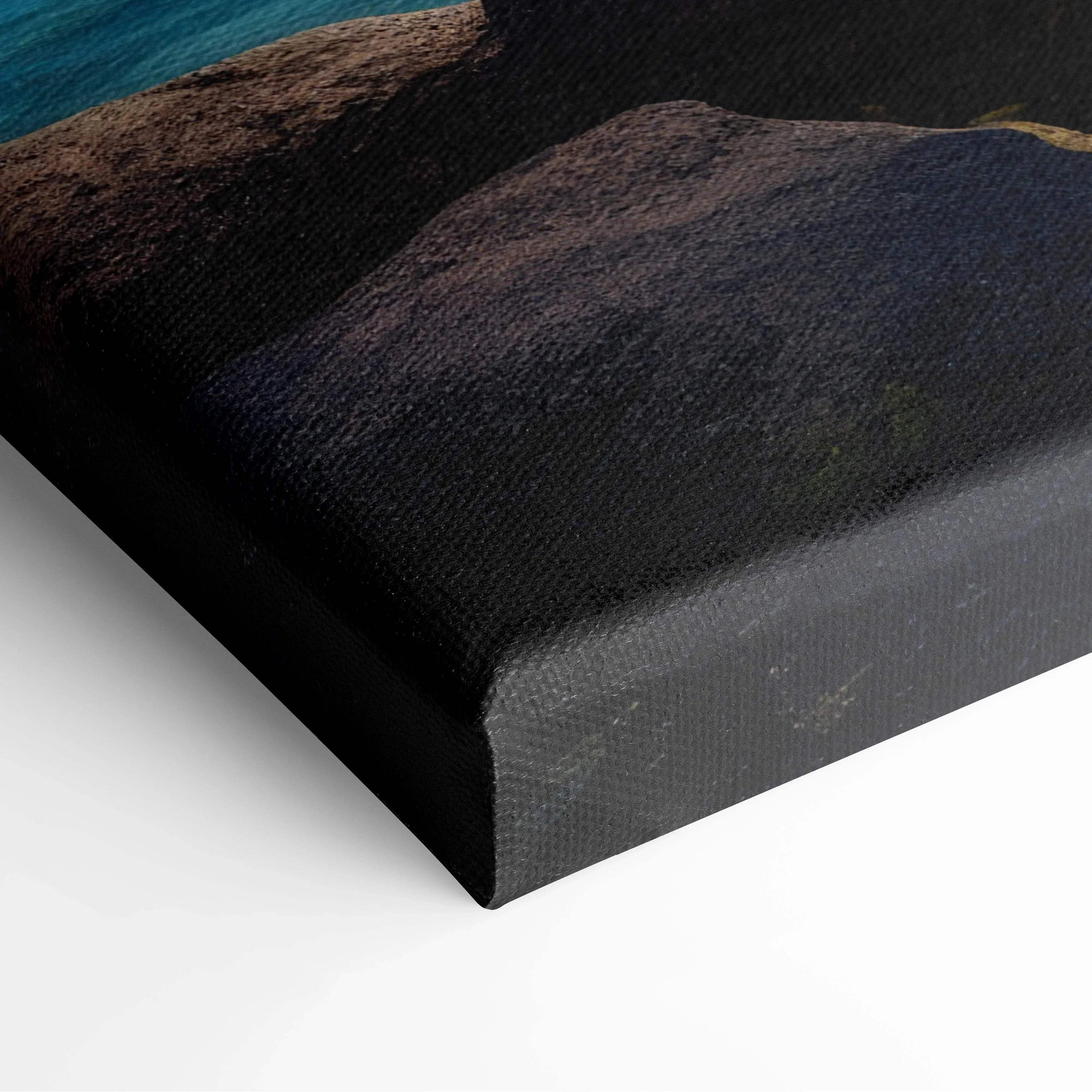 Black textured canvas print of rocky cliffs, turquoise water, palms, ocean blues