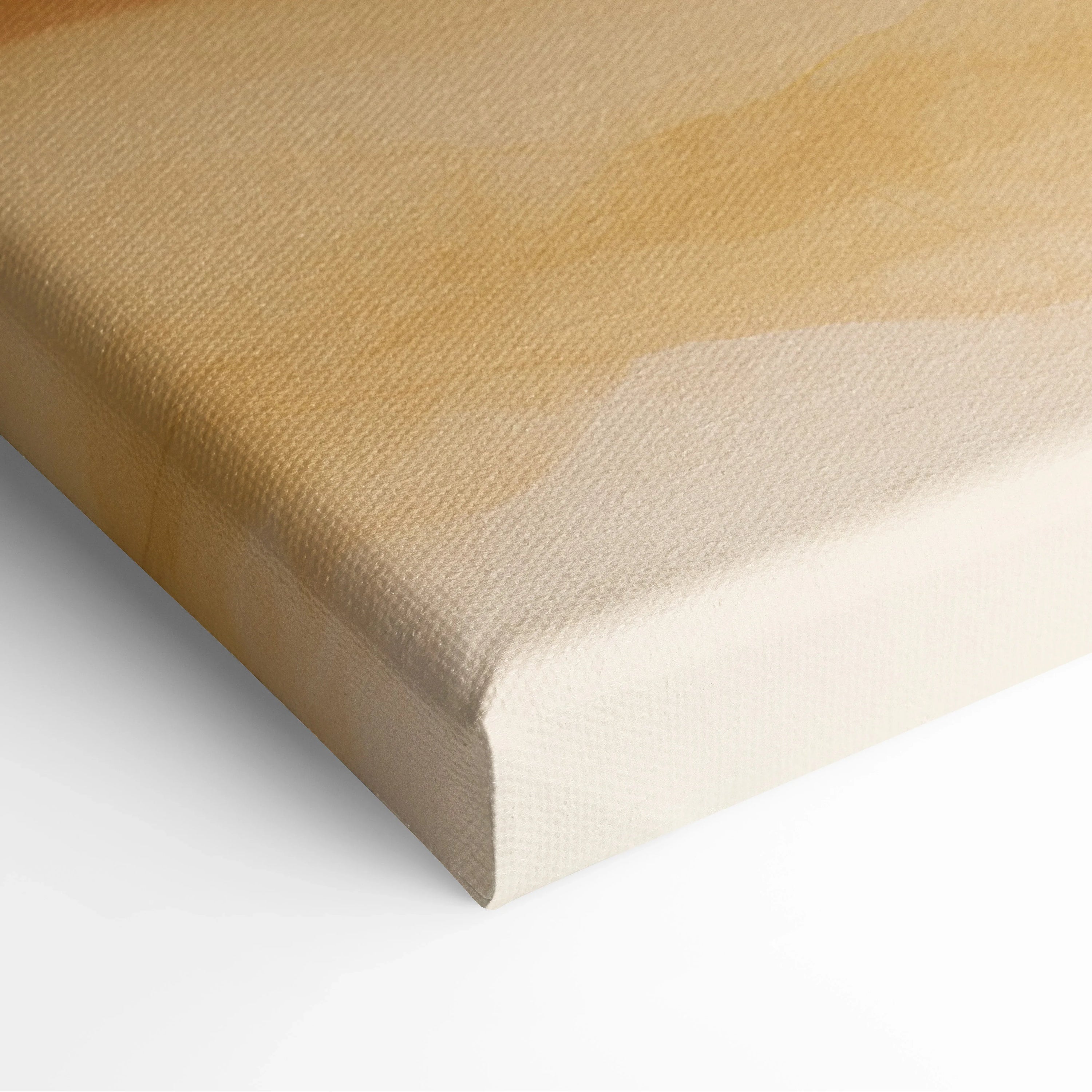 Close-up of canvas wall art corner showcasing textured fabric with soft beige and white gradient tones.