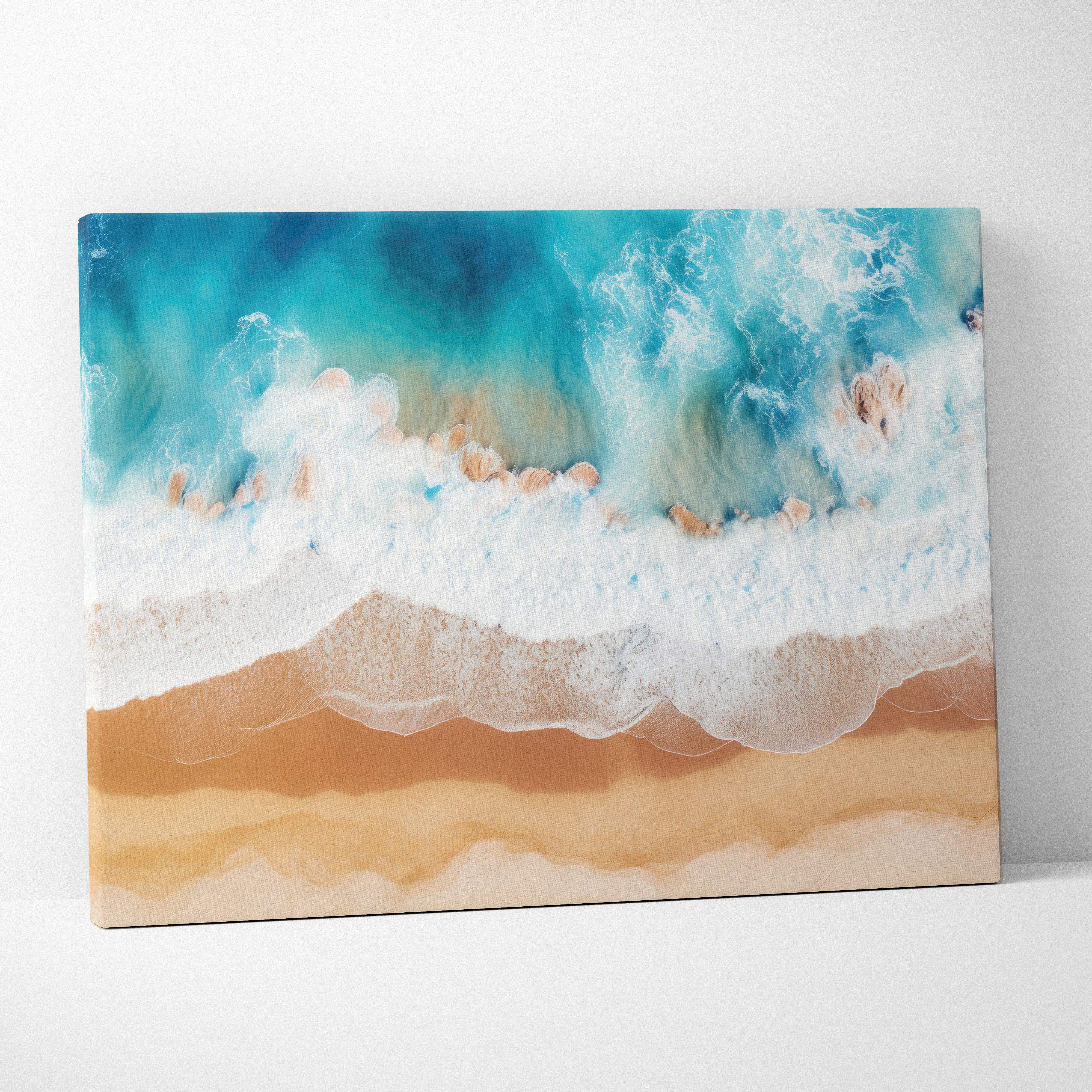 Calming turquoise blues canvas wall art showing a vibrant ocean wave crashing on sandy shores in rich turquoise and gold tones