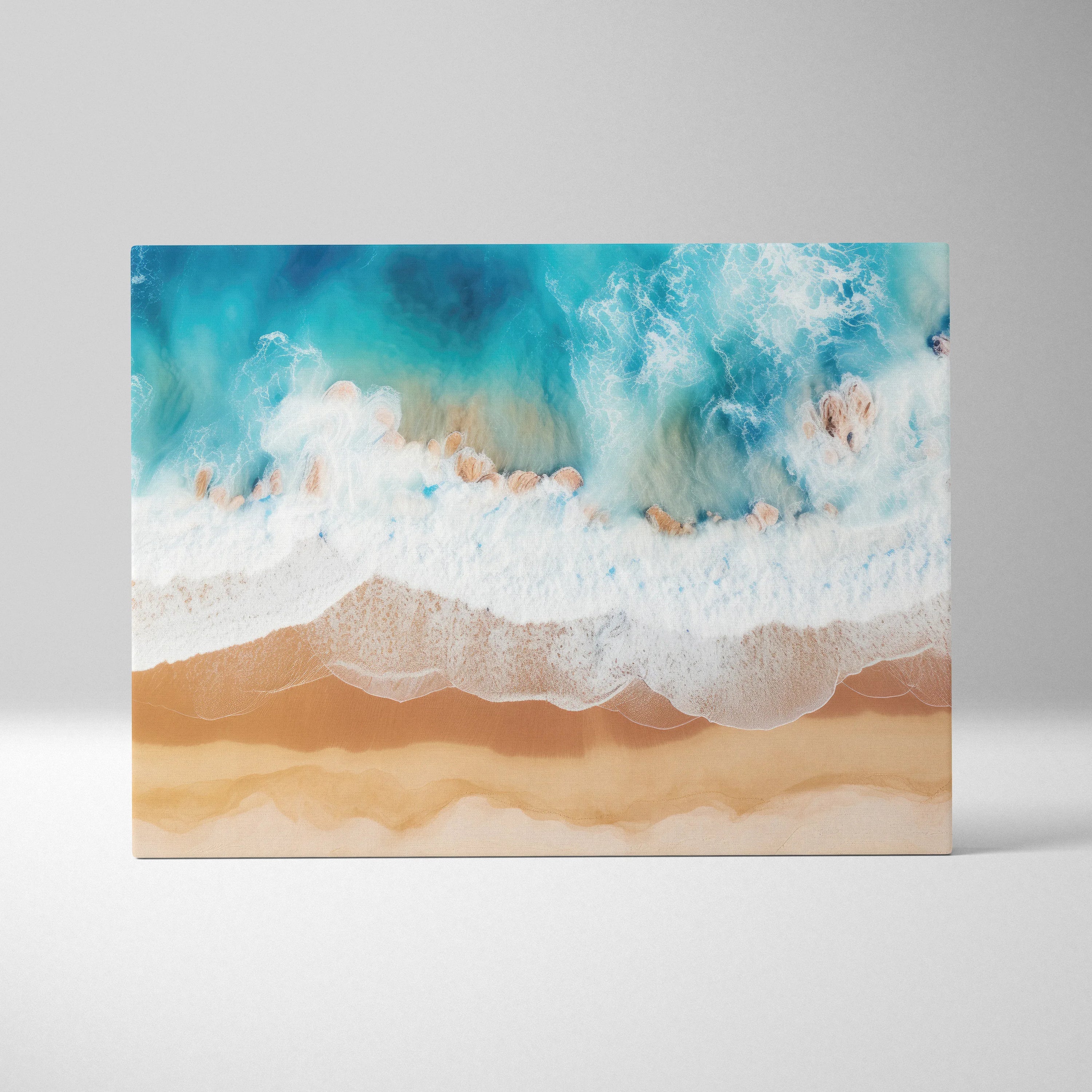 Canvas wall art featuring a tranquil beach coastline with turquoise ocean waves gently crashing onto sandy shore.