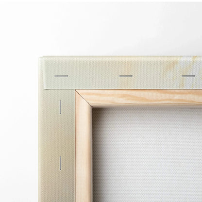 Close-up of wooden frame and stapled canvas corner for floral wall art decor.