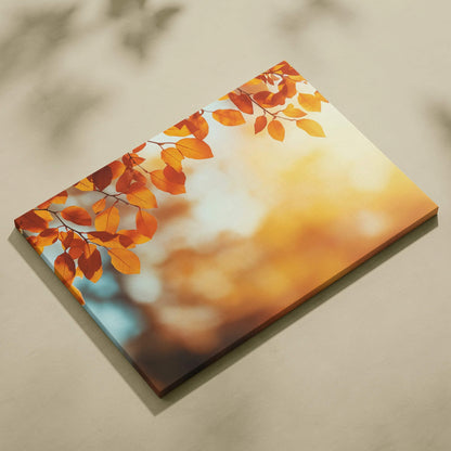 Canvas wall art featuring vibrant autumn leaves in warm orange and golden tones with a soft, blurred nature background.