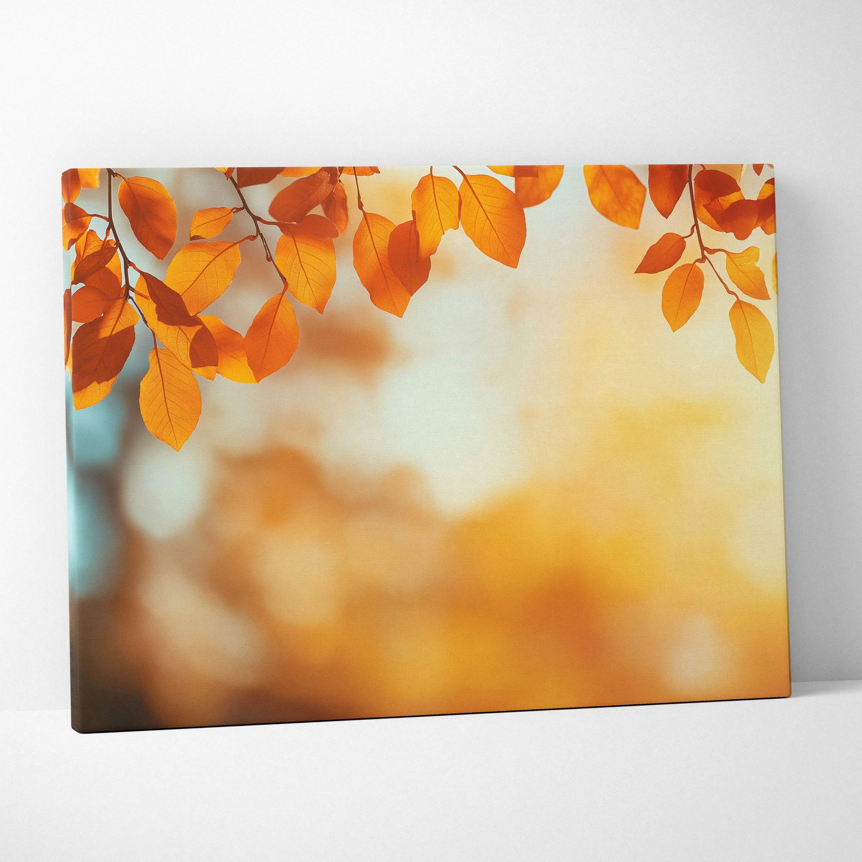 Canvas wall art featuring vibrant golden autumn leaves with a blurred, warm-toned nature background.
