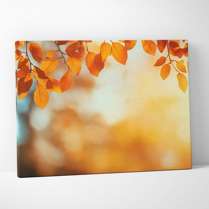 Canvas wall art featuring vibrant golden autumn leaves with a blurred, warm-toned nature background.