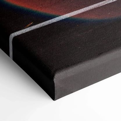 Close-up of black canvas wall art with white geometric lines and subtle rainbow reflection on textured surface.