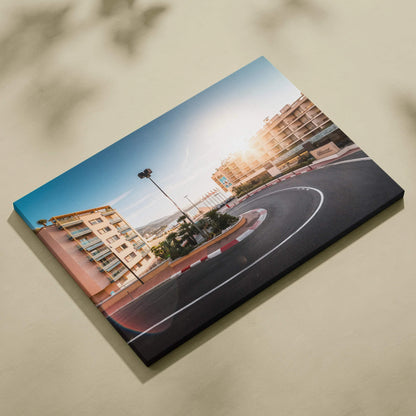 Canvas wall art featuring a curved Monaco F1 street circuit hairpin turn framed by urban buildings under a clear sky.