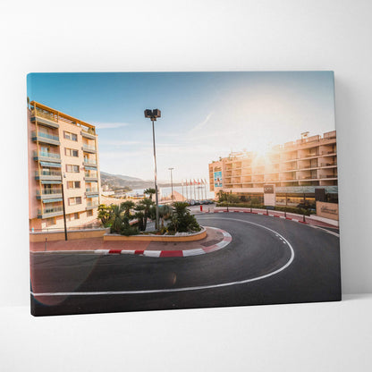Canvas wall art featuring a curved Monaco F1 track hairpin corner with buildings and a sunlit sky.