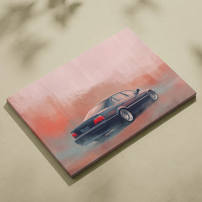 A canvas print of a sleek black BMW e36 sedan in motion with pink and orange gradient background for office wall art