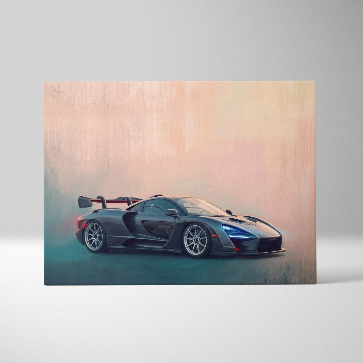 A matte black mclaren senna sports car with a rear wing depicted on track edition canvas wall art print