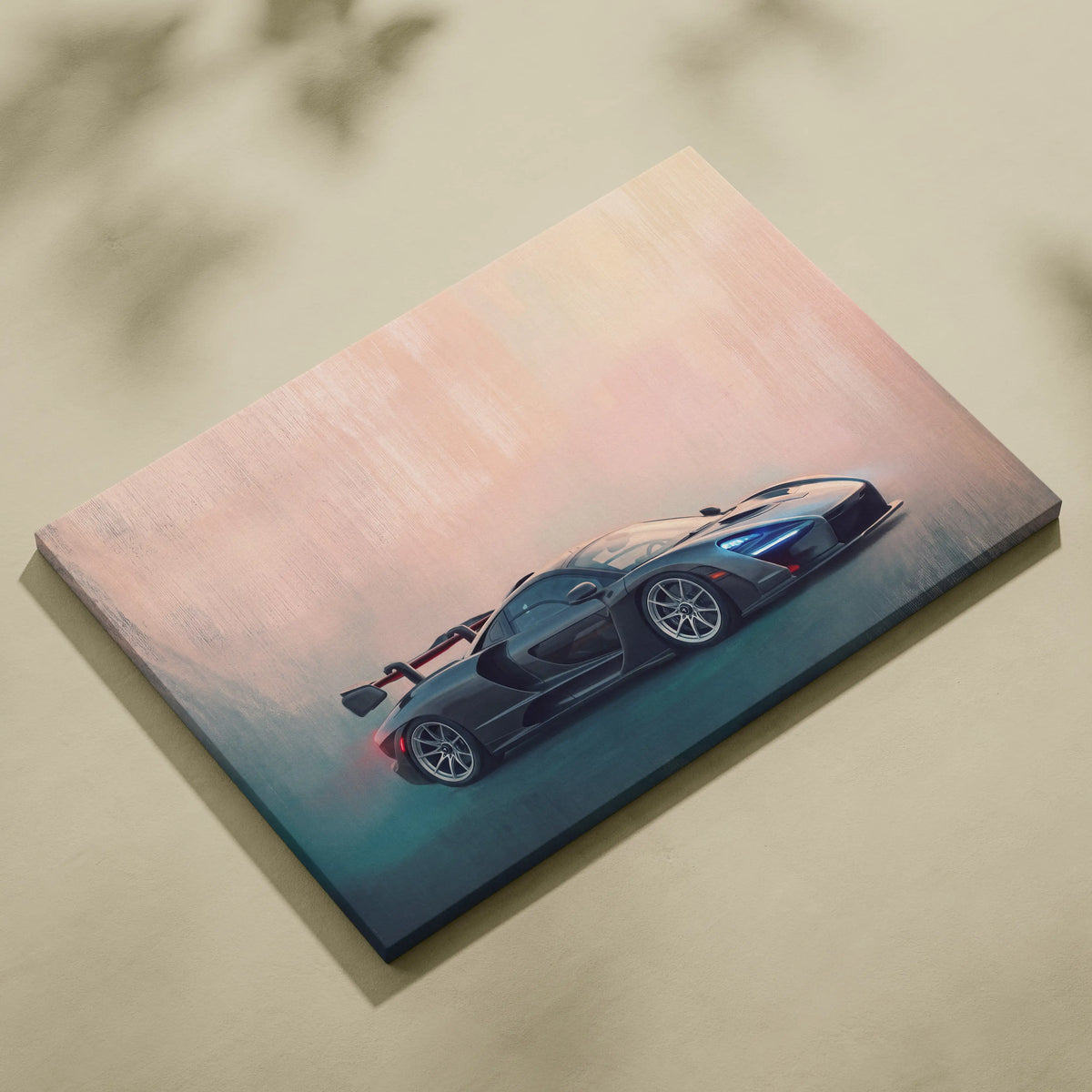 A sleek black McLaren Senna inspired sports car wall art with glossy finish and blue red accent lighting on canvas
