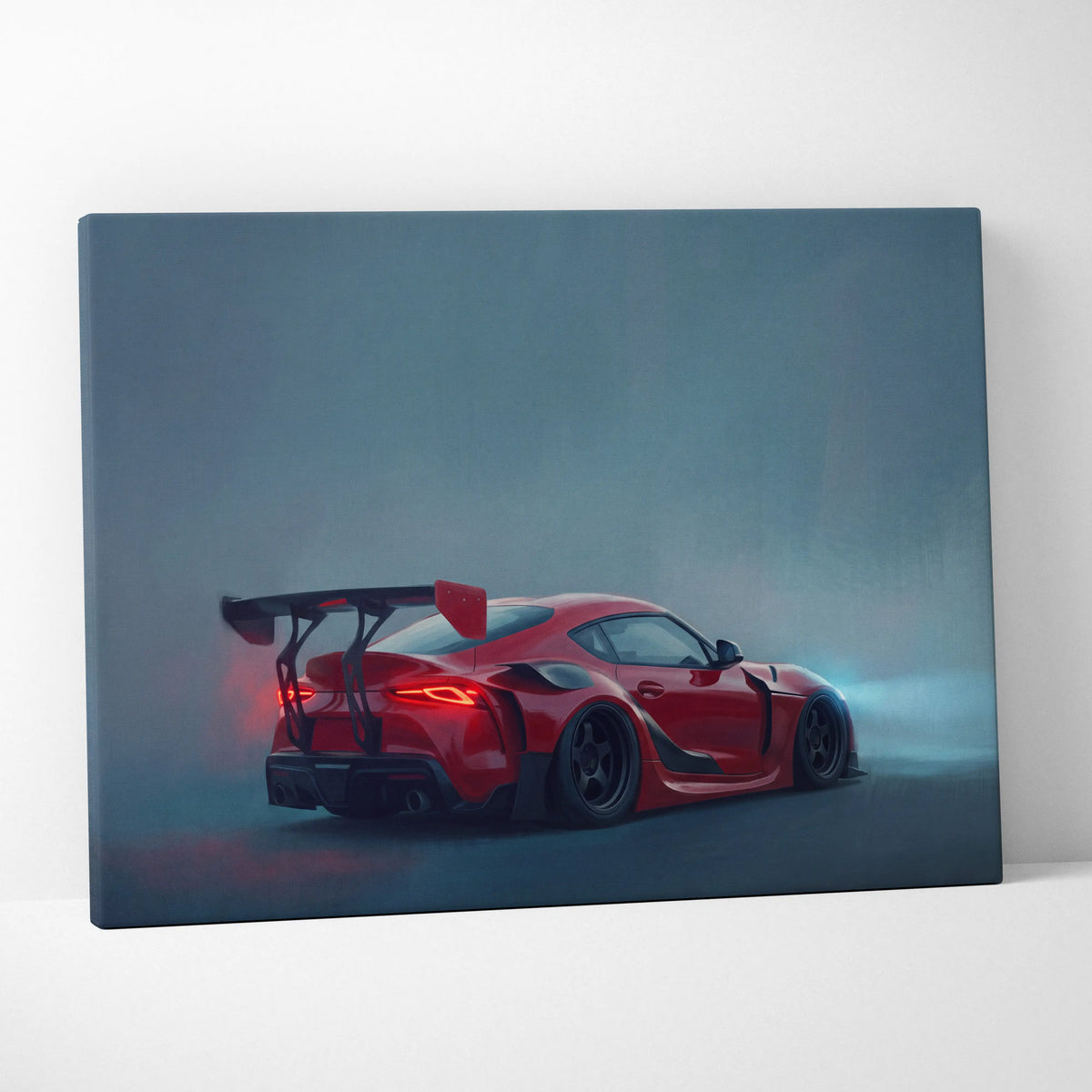 Red sports car canvas print featuring sleek aerodynamic design and glowing taillights for office decor
