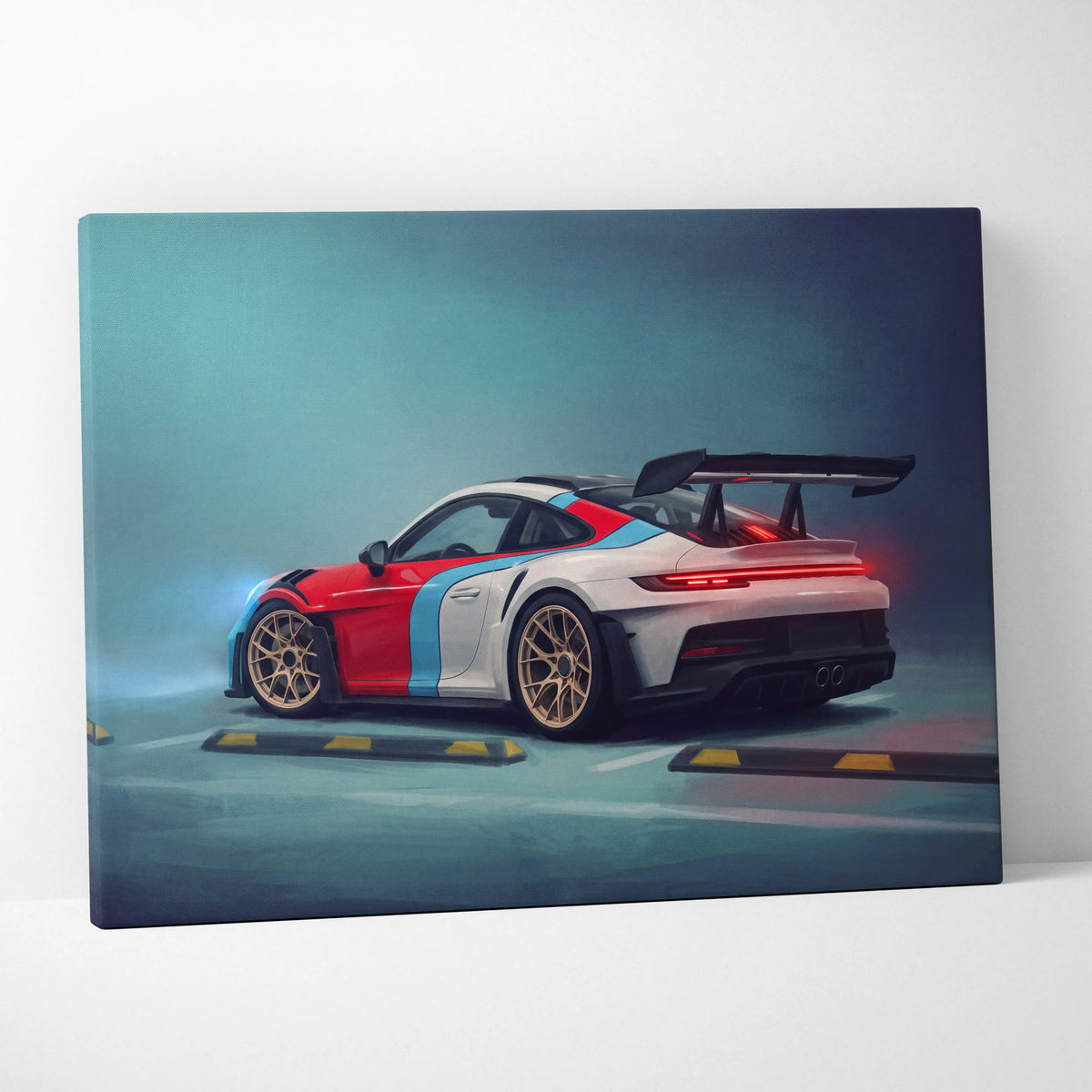 A vibrant red white and blue Porsche 911 GT3 RS inspired canvas print with gold rims and rear spoiler wall art