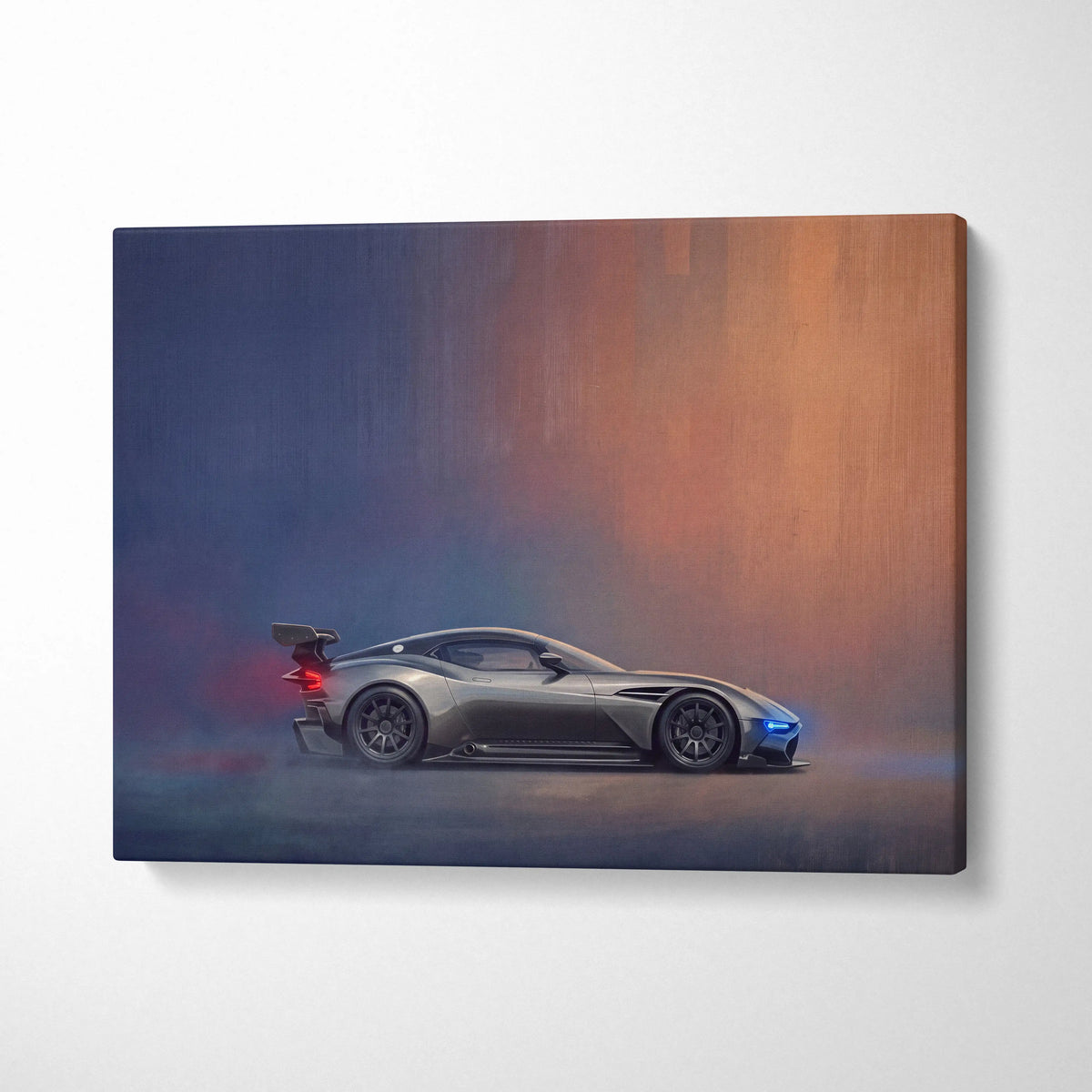 Aston Martin Valkyrie matte gray sports car canvas print with glowing blue and red wheel and taillight accents