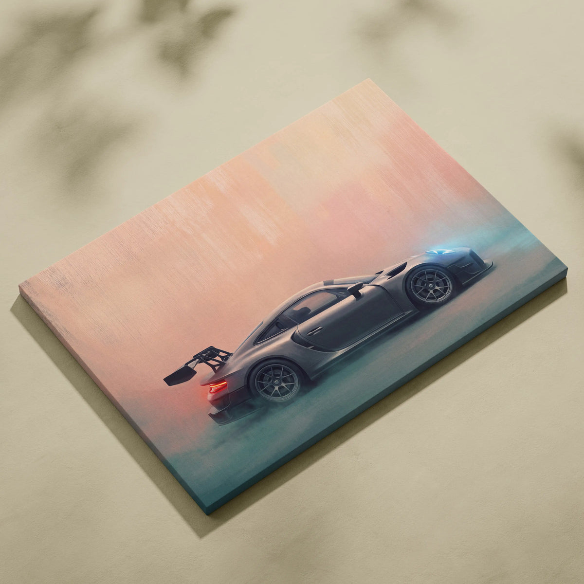 Porsche 911 gt3 rs inspired automotive wall art featuring a matte black sports car with rear wing on canvas print